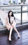 Model muda terbaik Long Xueer dari Xiuren.com dan gambar peribadinya bersama jurugambar.