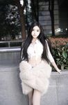 Model muda terbaik Long Xueer dari Xiuren.com dan gambar peribadinya bersama jurugambar.