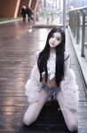 Model muda terbaik Long Xueer dari Xiuren.com dan gambar peribadinya bersama jurugambar.