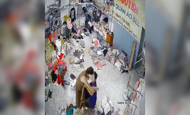 Pemilik sebuah gudang pakaian telah diseret dan dirogol ketika dia sedang menyusun barang.